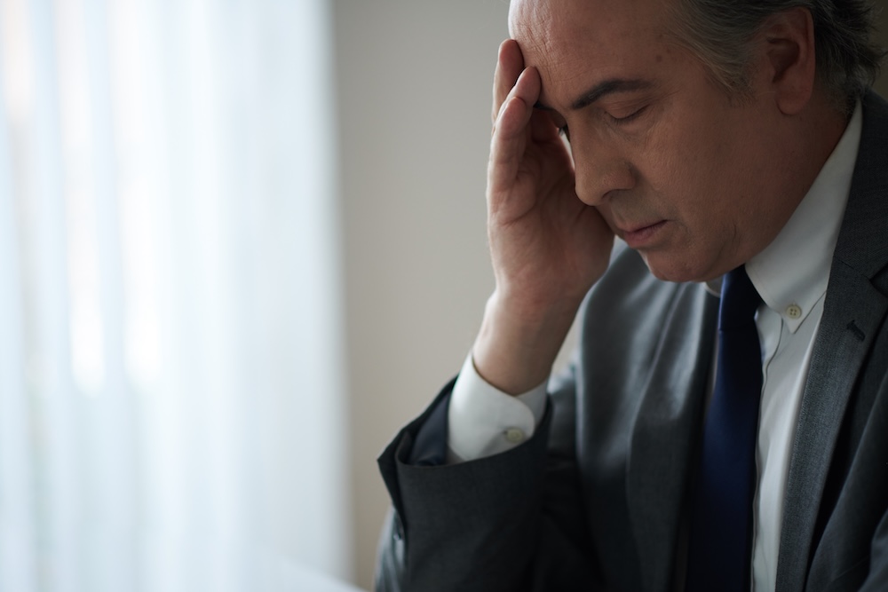 a man stressed at work
